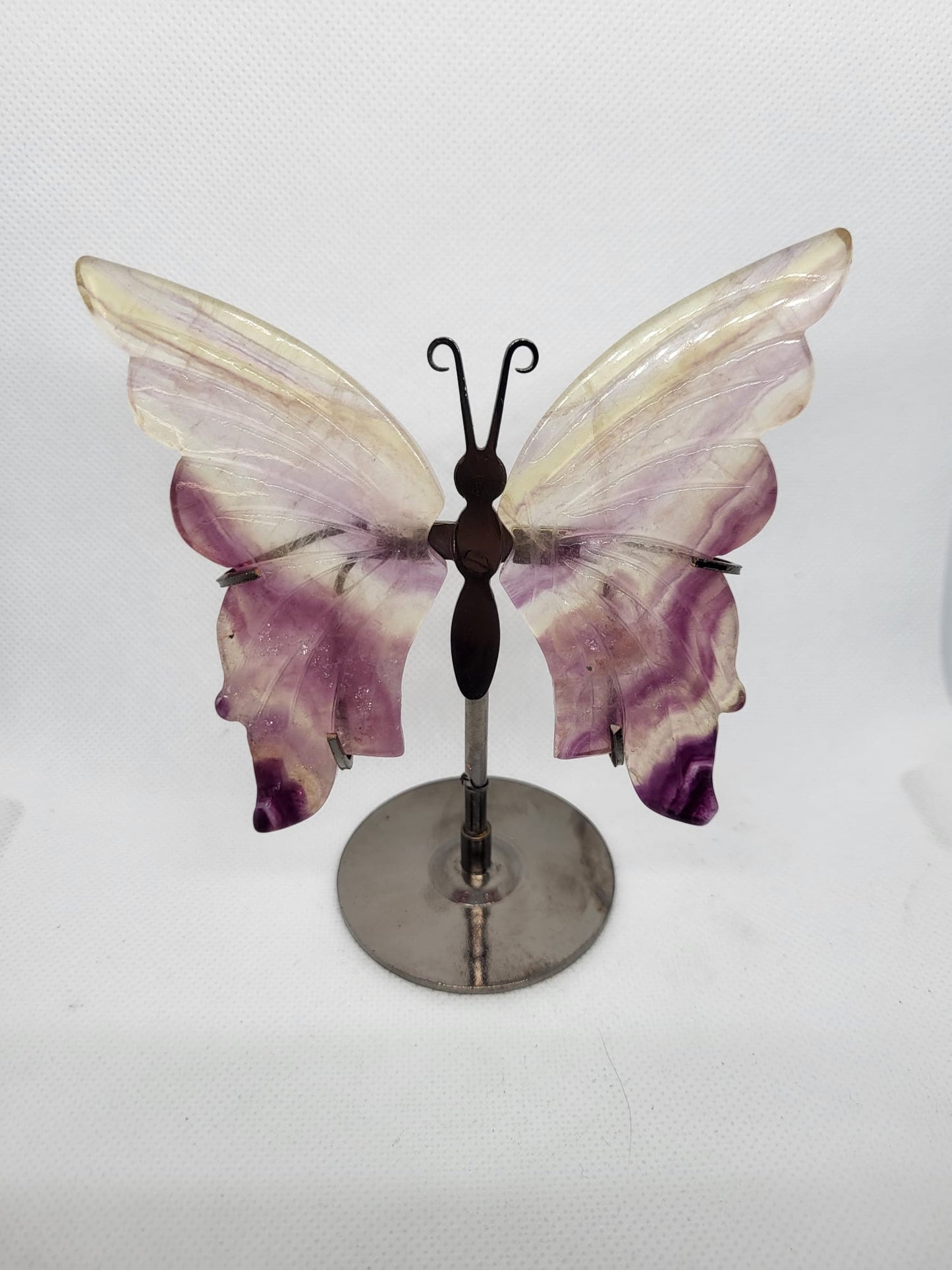 Schmetterling auf Ständer