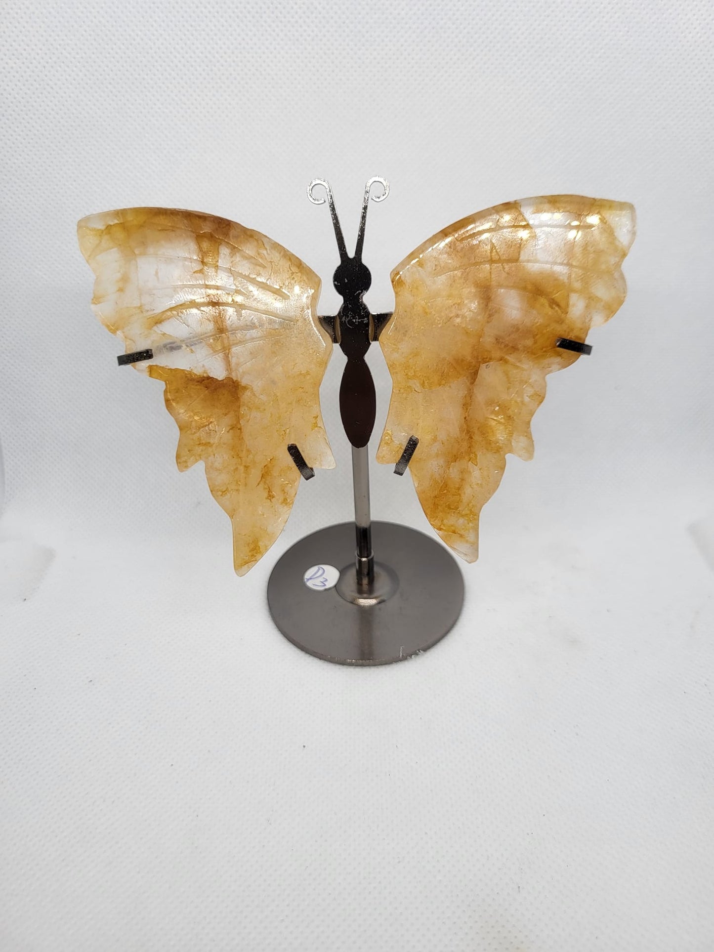 Schmetterling auf Ständer