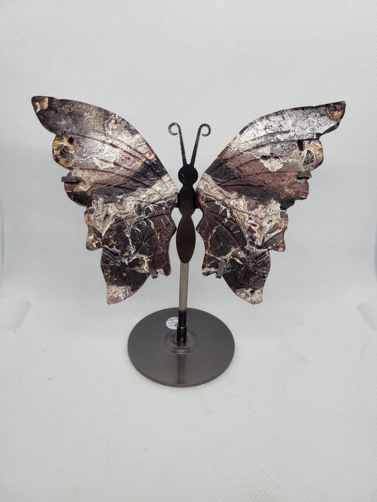 Schmetterling auf Ständer